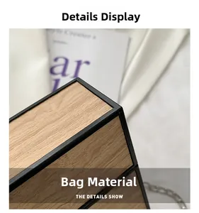 Detailed macro view of wood grain finish texture with black frame on the box bag