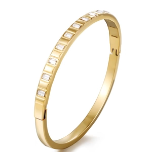 Detail of 18K gold plated stainless steel bracelet with rectangular zircon inlay