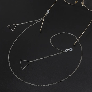 Close-up of silver glasses chain with triangle pendant and anti-slip rubber loops