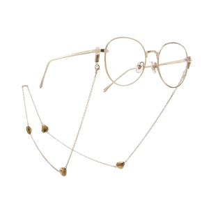 Occhiali tondi dorati con catenella e ciondoli a cuore per uno stile elegante e retrò