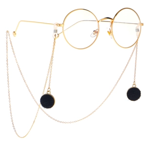 Lunettes rondes dorées rétro avec chaîne en métal et pompons noirs décoratifs