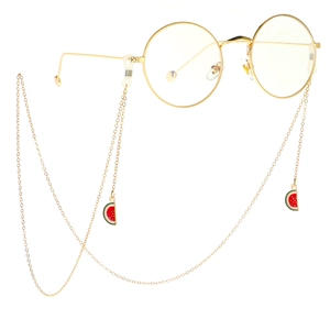 Golden eyewear chain with watermelon pendants and retro round metal frame sunglasses