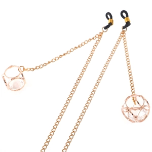 Golden anti-slip eyewear chain with hollow rhinestone charms on white background