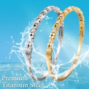 Waterproof titanium steel bangles set with crystals in gold and silver finish