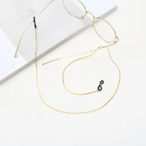 Elegant gold snake chain eyewear holder with non-slip silicone loops for sunglasses