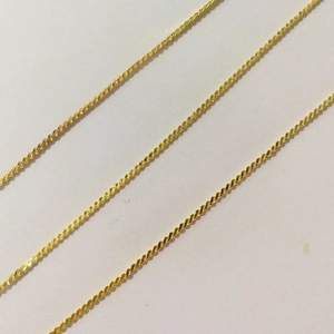 Three elegant gold metal eyeglass chains with stylish water wave link design on white background