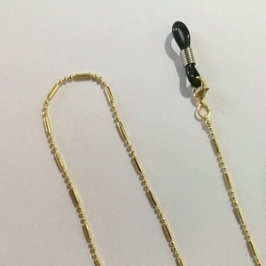 Catenella per occhiali in metallo dorato con tubi cilindrici e gommini antiscivolo
