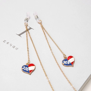 Golden eyewear chain featuring heart-shaped American flag charms and non-slip loops
