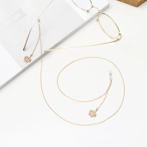 Golden anti-slip eyewear chain featuring hollow crown pendants and rubber ends for glasses