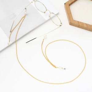Goldene Brillenkette mit weißen Perlen und verstellbaren Gummischlaufen für Brillen