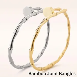 Polished bamboo style 18K gold and silver stainless steel bangles for women
