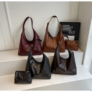 Close-up of vintage large capacity tote bags in four colors with matching small pouches
