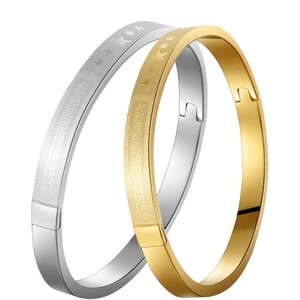 Bracelets ovales en acier inoxydable poli or et argent avec motifs d'étoiles gravés