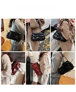 Detailed views of black and wine red glossy leather shoulder bags with multi-pocket design