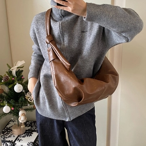 Vintage dark brown PU leather crescent bag with knot detail and spacious interior