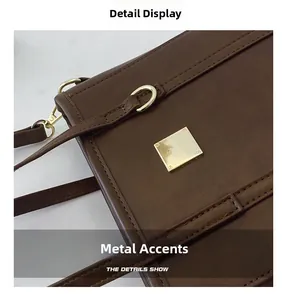 Detailed macro of dark brown leather texture with polished gold square hardware accent