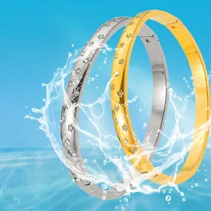 Waterproof 18K gold and silver star engraved titanium steel bangles with tiny diamonds