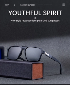 Close-up of black polarized rectangle sunglasses with textured luxury storage case
