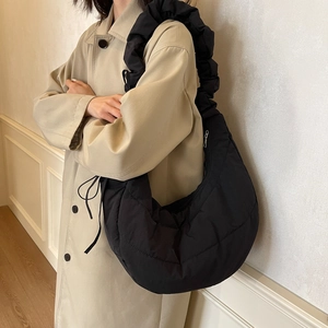 Quilted black puffer hobo bag with ruffle strap and large capacity for women