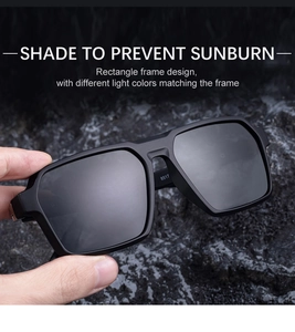 Close-up of black square polarized sunglasses with model 8517 on rock background
