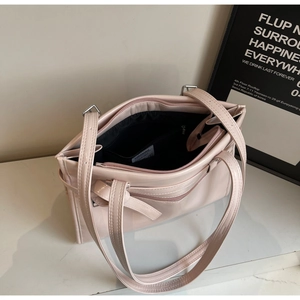 Top view of pink PU leather tote showing interior black lining and zipper closure