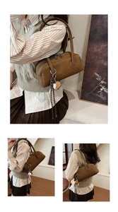Close-up of retro brown bowling bag featuring textured leather and decorative charm