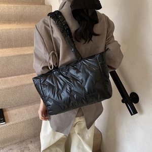 Fashionable black quilted nylon tote bag with ruched shoulder strap for 2024 autumn winter