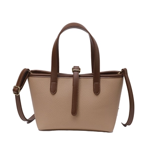 Litchi pattern leather tote bag in dark brown and beige with adjustable shoulder strap