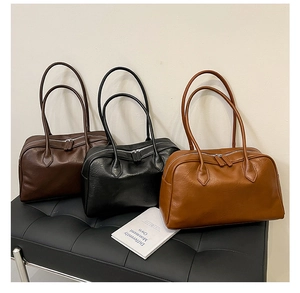 Three retro large-capacity leather tote bags in coffee, black and caramel colors