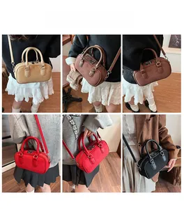 Detail view of stylish small Boston bags in four colors shown on models for daily use