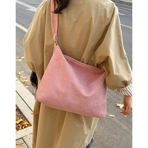 Pink minimalist matte hobo bag for women in autumn street style with metal ring strap