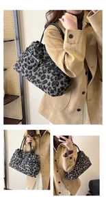 Close-up of leopard print faux fur texture and black leather strap on a tote bag