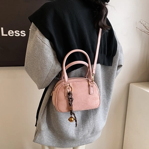 Pink frosted leather Boston handbag with double handles and shoulder strap for women