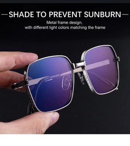 Vue macro de lunettes de soleil carrées en métal avec relief d'étoile et verres dégradés