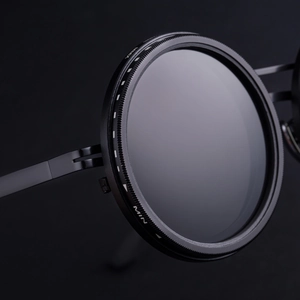 Close-up of adjustable VND camera lens filter with MIN to MAX scale markings
