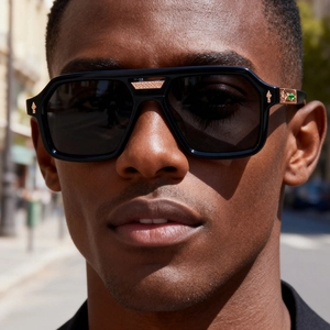 Men's retro square sunglasses with metal temples and gemstone accents in outdoor setting