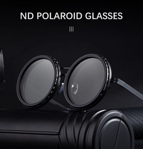 Detail of adjustable ND filter dial on vintage round metal frame sunglasses