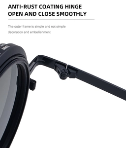 Detail of rust-resistant hinge on round sunglasses with MMX logo and smooth opening
