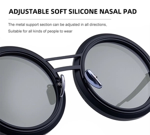 Detail of adjustable soft silicone nose pads on round sunglasses for custom comfort