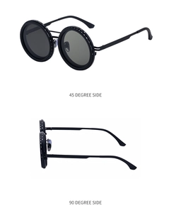 Macro detail of round metal sunglasses frame featuring ND adjustment knobs and scales