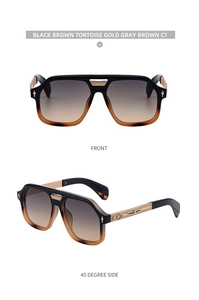 Detail view of square navigator sunglasses with textured gold temples and gradient lenses