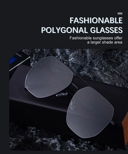 Lunettes de soleil polygonales avec monture en métal noir sur support texturé