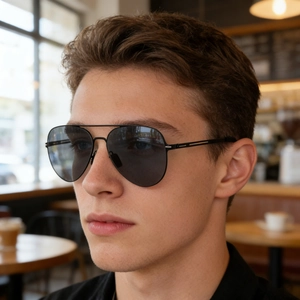 Side view of men wearing classic black aviator sunglasses with polarized nylon lenses