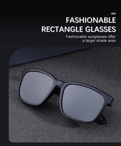 Detail of trendy square sunglasses with large black frames and dark grey polarized lenses