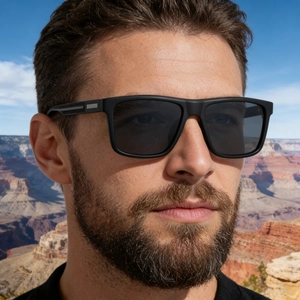 Detail of square polarized sunglasses with metal accents and anti-slip mesh on temples