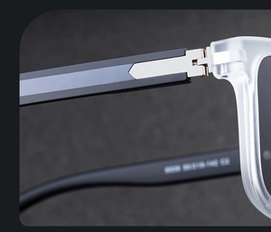Detailed close-up of premium metal hinge and dual-tone PC temple on square sunglasses