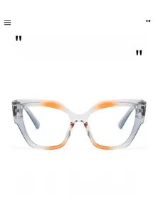 Detail of cat-eye frames featuring gradient grey design and orange color block accents