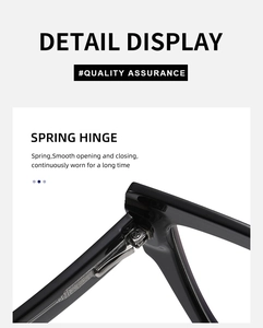 Detailed close-up showing the smooth spring hinge of these black cat-eye optical glasses
