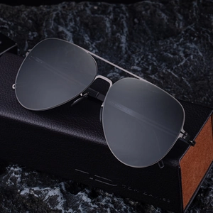 Polarized nylon aviator sunglasses with a classic double bridge and dark metal frame