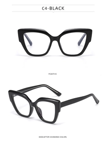 Cat eye glasses frame in C4-black featuring bold rims and smooth glossy finish